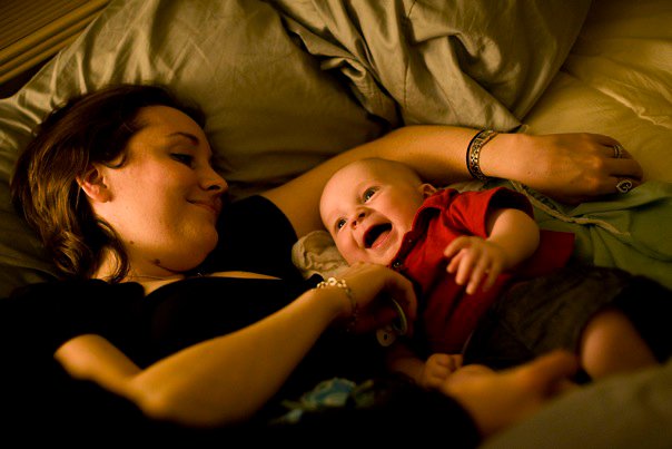 em and ryan laughing in bed