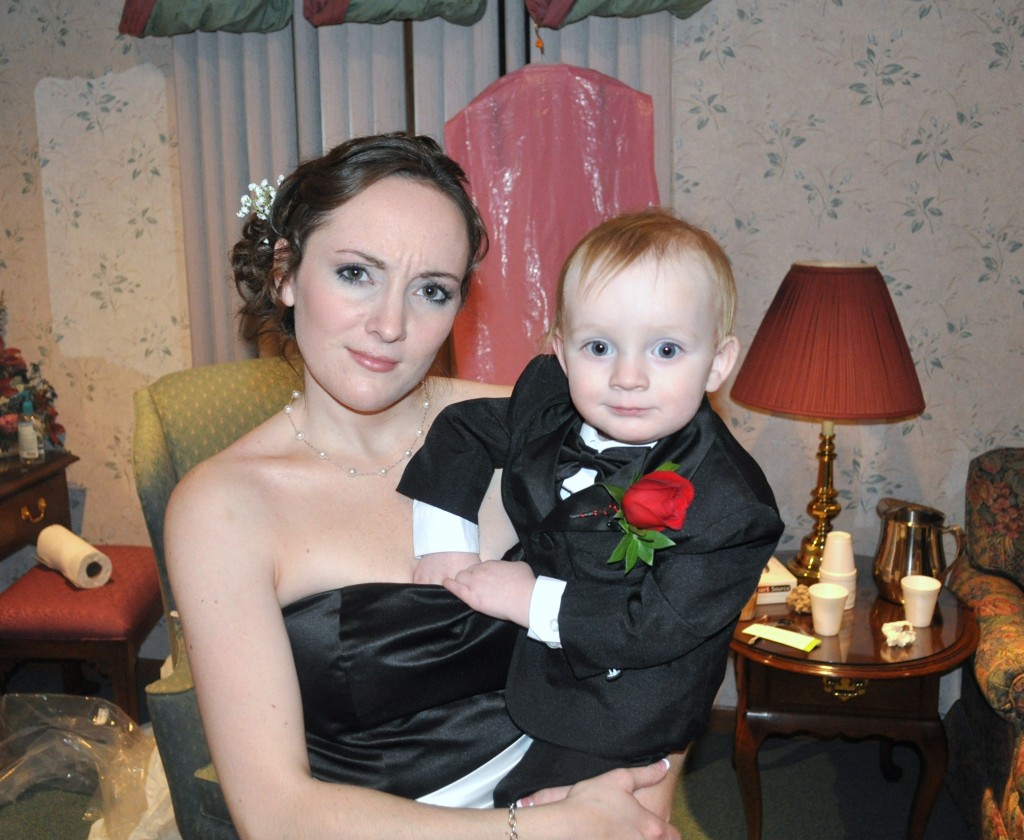 It's a baby in a tux! It's a baby in a tux!
